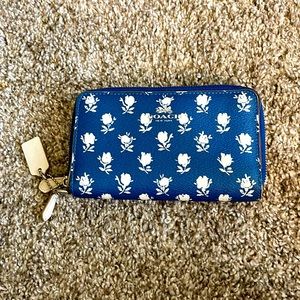 Blue coach wallet with white flowers